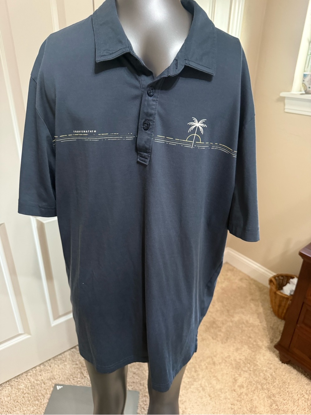 Travis Mathew Navy Short-Sleeve Polo with Palm Graphic